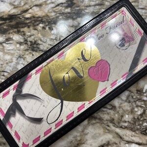 Hardly used too faced love eyeshadow palette